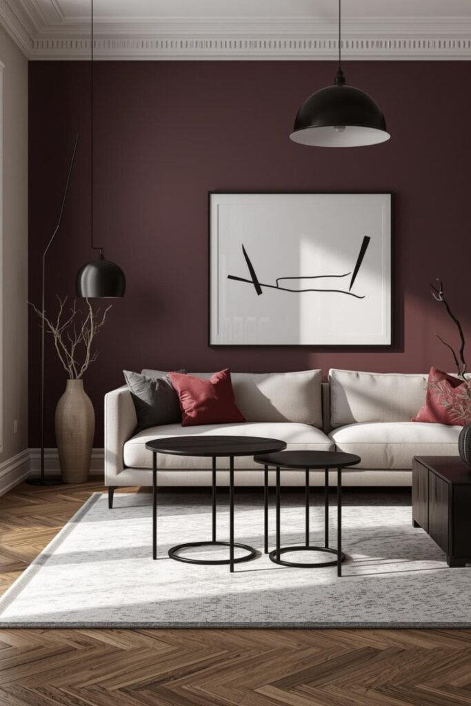 Aubergine Accent Wall with Minimalist Art and Soft Beige Sofa