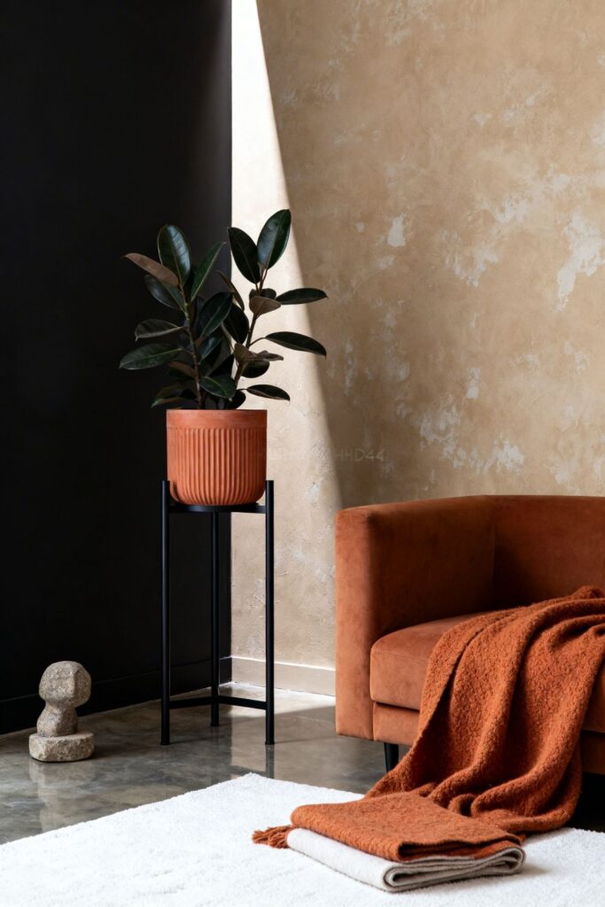 Black Metal Plant Stand Corner With Ribbed Clay Pot