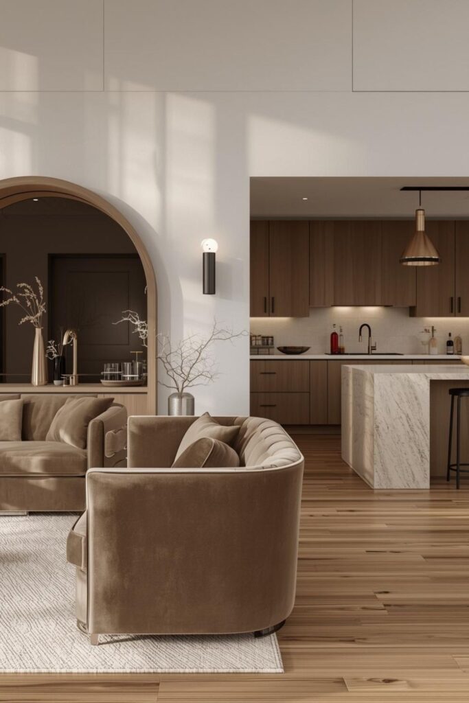 Taupe Suede Arc Sofa With Brass Kitchen Details And Bar